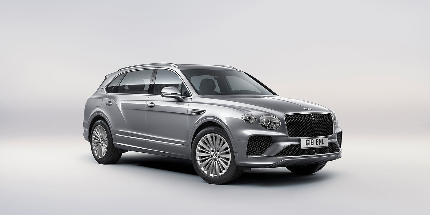 Bentley Jakarta Bentley Bentayga Extended Wheelbase luxury SUV front three quarter view in Moonbeam paint with 21 inch five spoke painted wheels