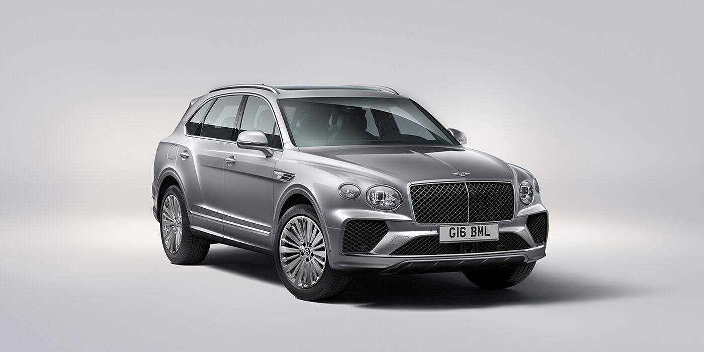 Bentley Jakarta Bentley Bentayga luxury SUV front three quarter view in Moonbeam paint with matrix grille and 21″ 5 spoke painted wheels