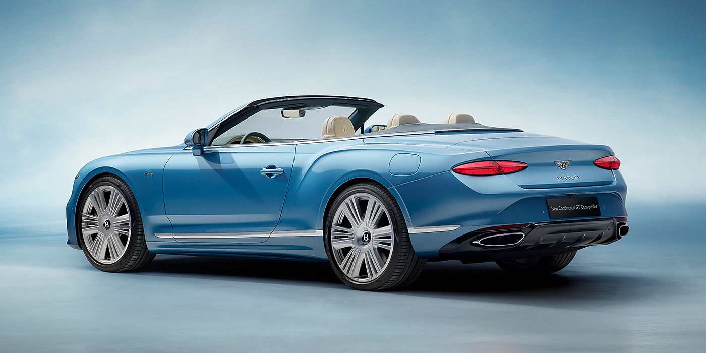 Bentley Jakarta New Bentley Continental GTC Azure convertible rear view in Light Windsor blue paint with 22 inch ten spoke wheels and chrome exterior details
